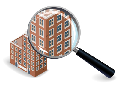magnify glass over building